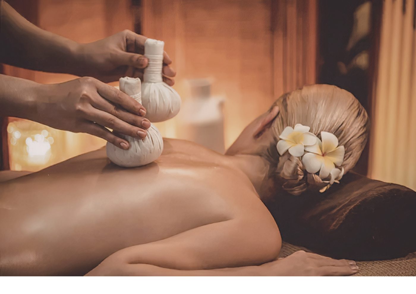 Herbal compress massage for a private in-home luxury wellness experience