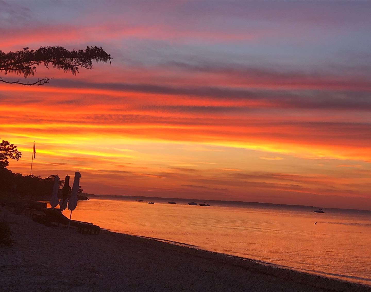 Sunset over the water at a Long Island beach retreat