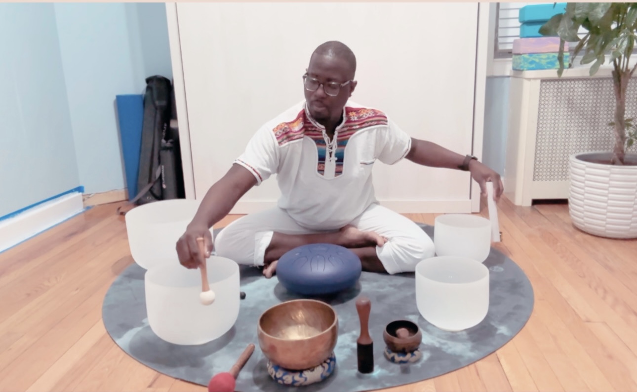 Crystal singing bowl sound healing session at Revolution Yoga in Rockville Centre
