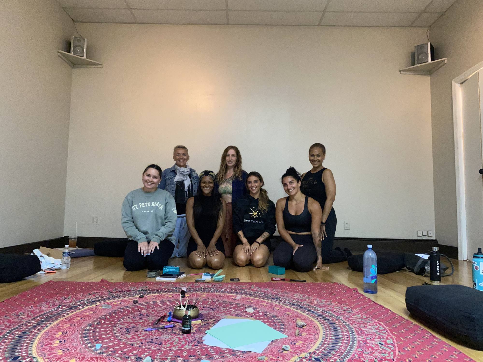 Jen Myers with students after a seated circle