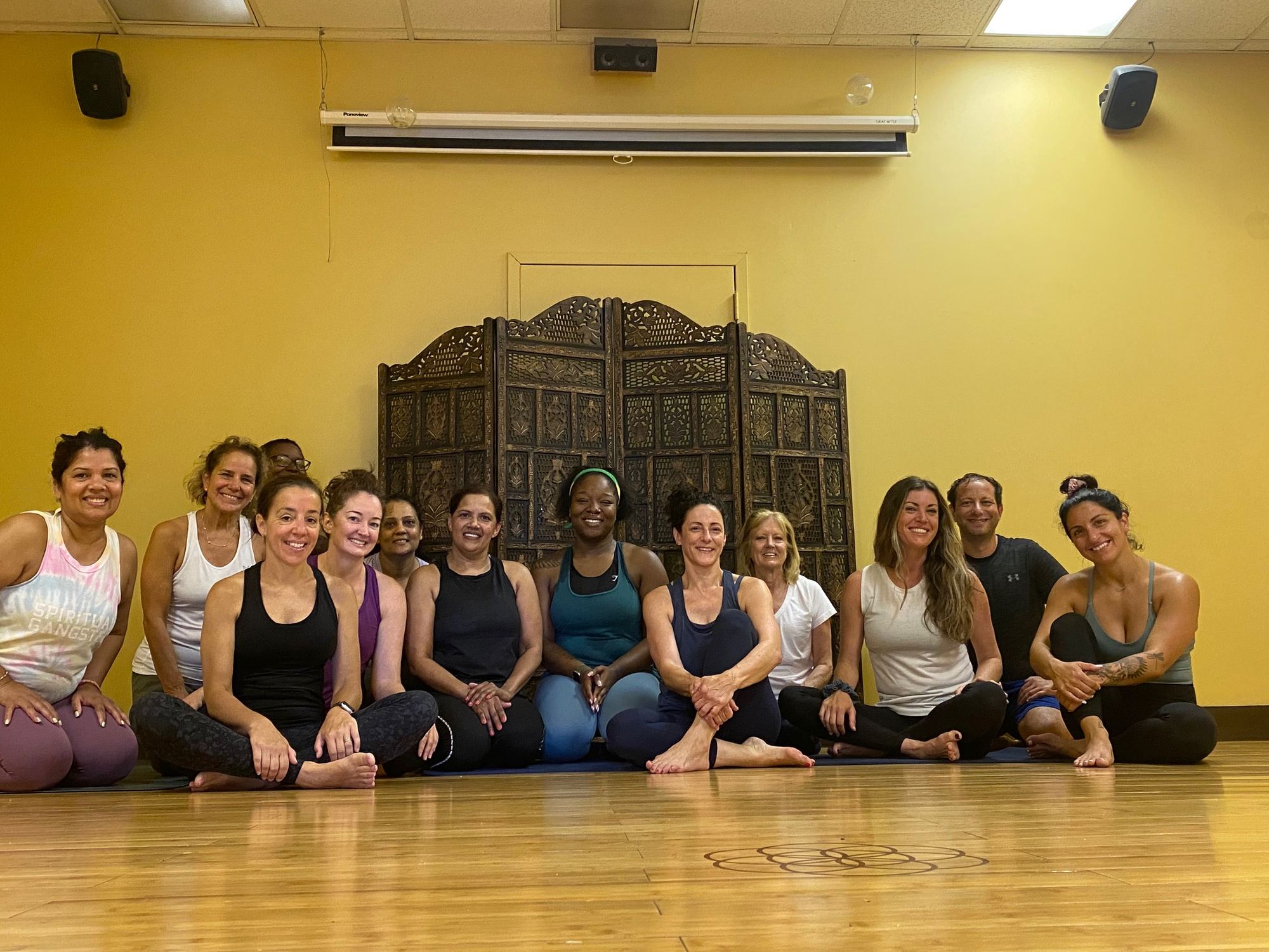 Jodi Langevin with a group of students in the studio