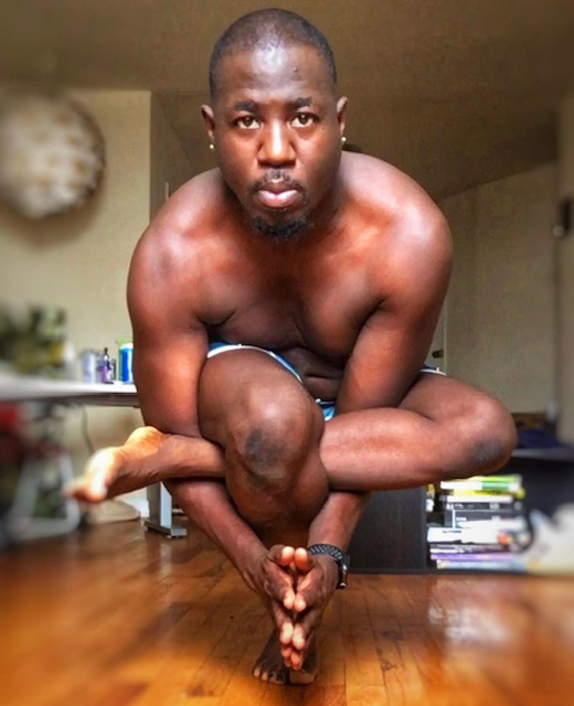 Rahmon Habeeb in an arm balance